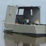 Bateau plat pour ramasser les huîtres cultivées dans les bras de mer. Dans la région de Rustico entre autres.